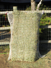 Freedom Feeder 125 lb 3-string bale net, slow feeder in tub
